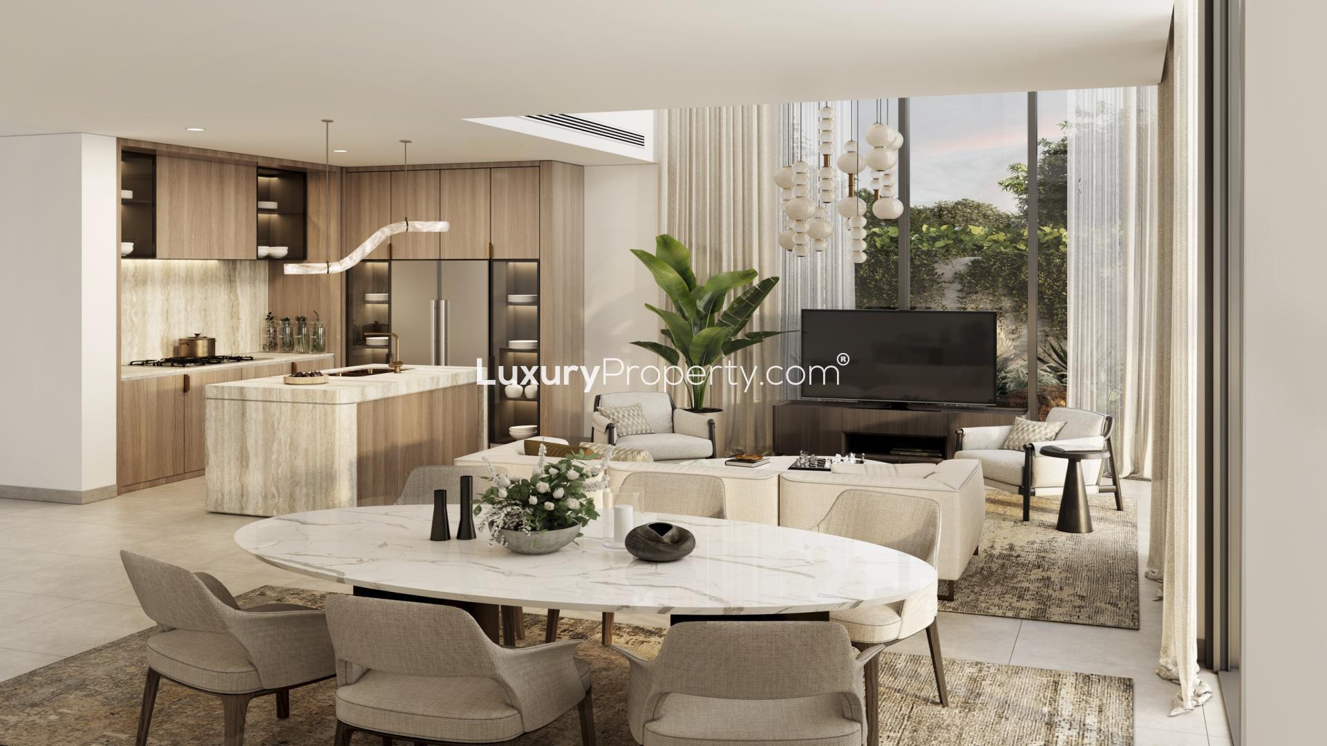 Modern bedroom in Mudon Al Ranim townhouse, featuring stylish decor and large window view