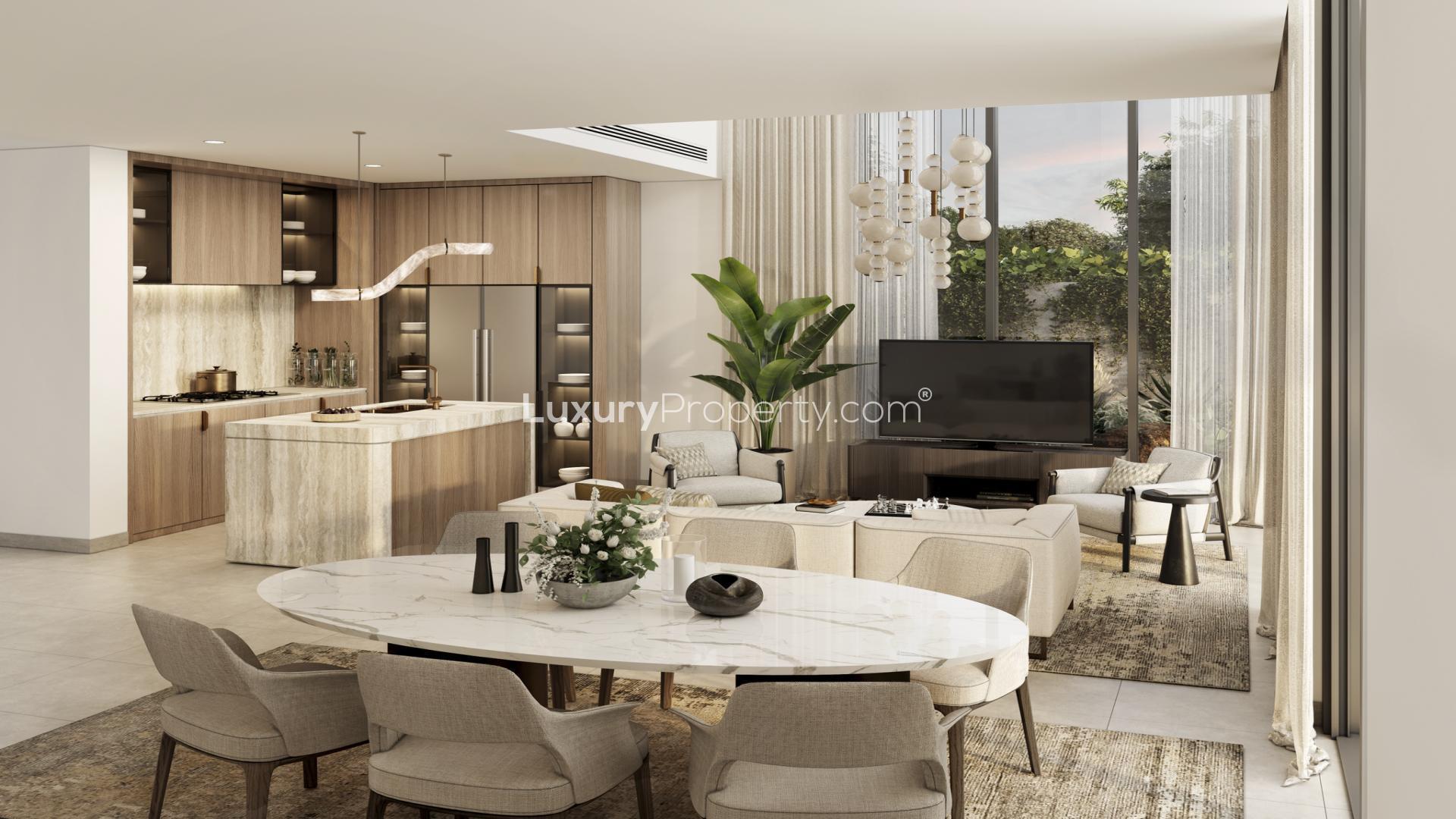 Modern bedroom in Mudon Al Ranim townhouse, featuring stylish decor and large window view