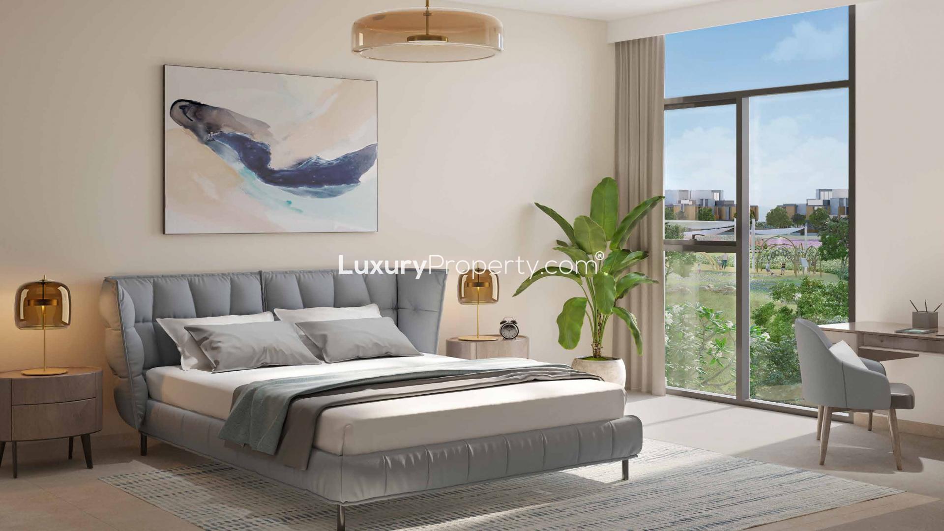 Modern open-plan living room and kitchen in Mudon Al Ranim 2 townhouse, Dubai