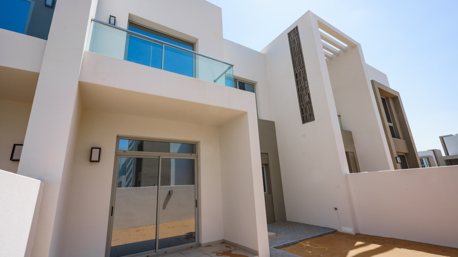 Exterior view of modern 3-bedroom townhouse in Reem, Arabian Ranches 2, for rent
