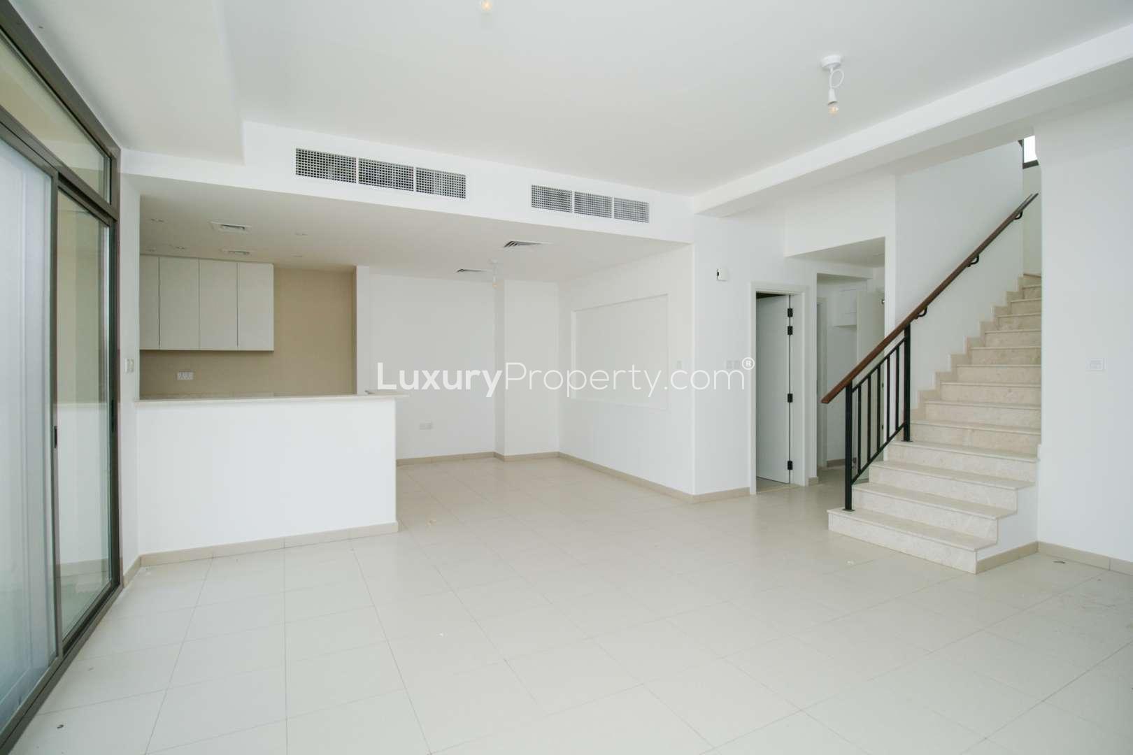 Modern kitchen and living area in 3-bedroom townhouse, Safi Town Square, for sale