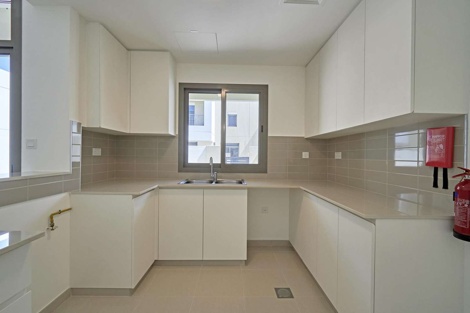 Spacious 3-bedroom townhouse exterior in Sama, Town Square, Dubai with garden view