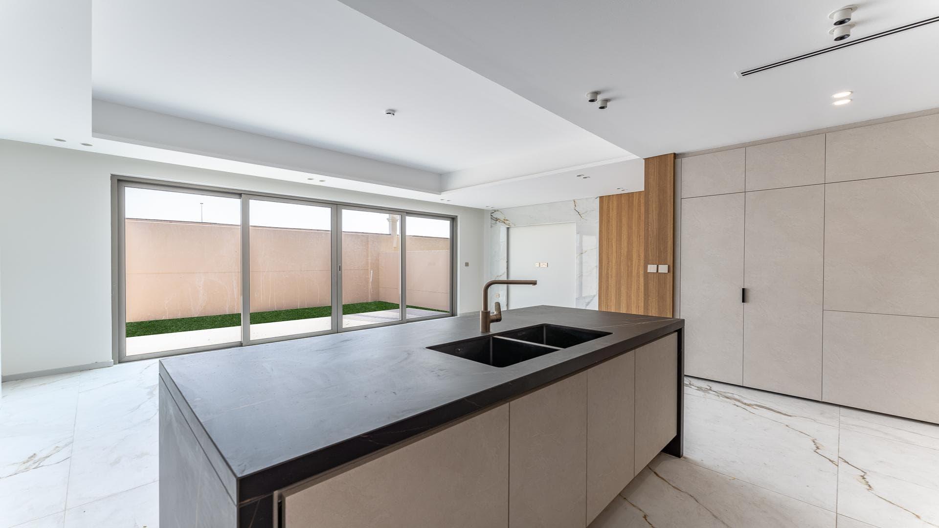 Modern kitchen in new three-bedroom townhouse, Jasmine Lane, Jumeirah Golf Estates