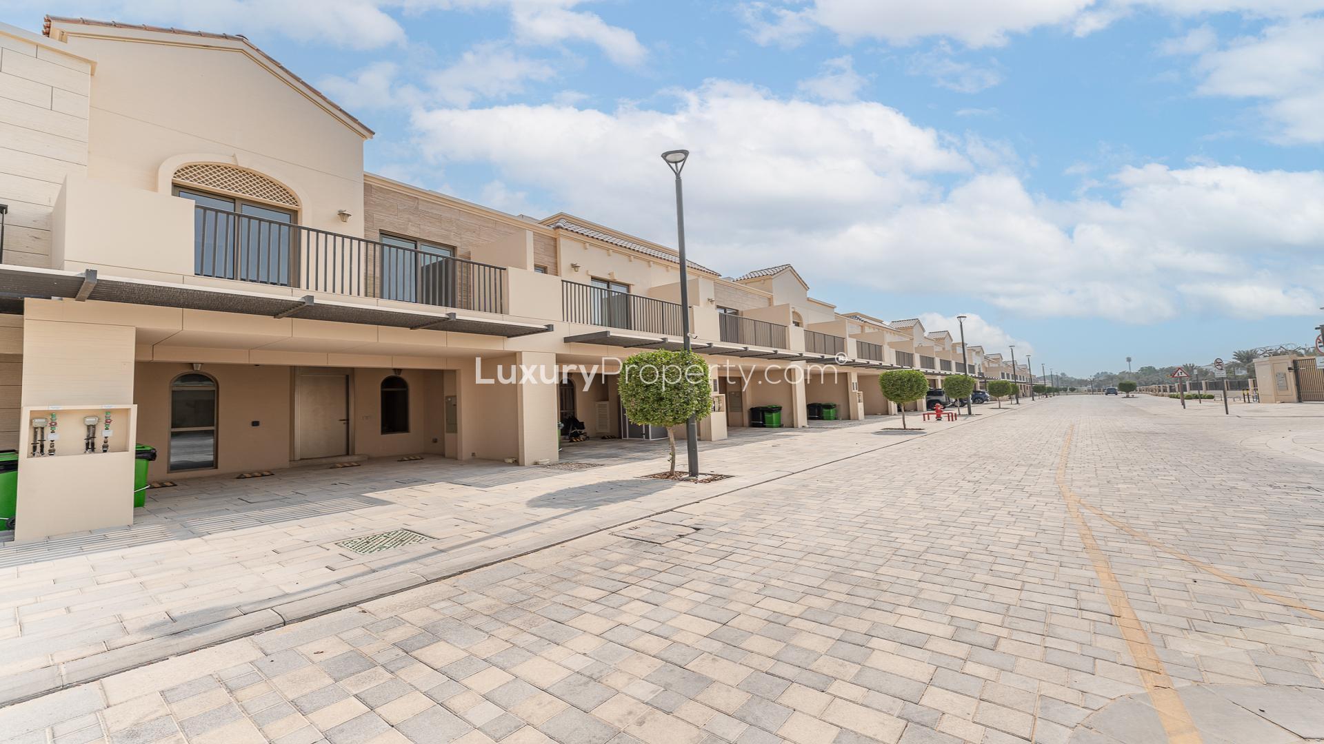 Townhouse exterior in Jasmine Lane, Jumeirah Golf Estates, perfect investor opportunity, best price