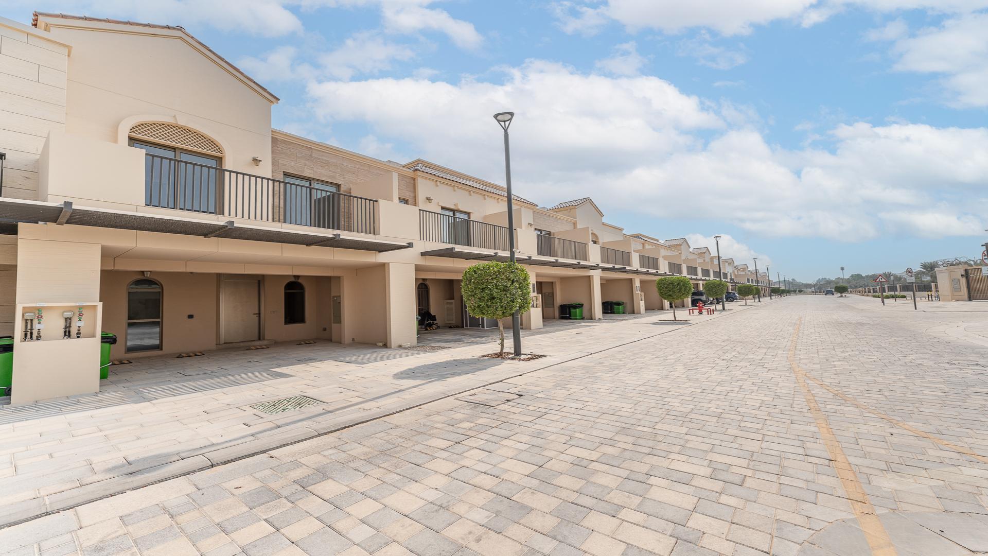 Townhouse exterior in Jasmine Lane, Jumeirah Golf Estates, perfect investor opportunity, best price