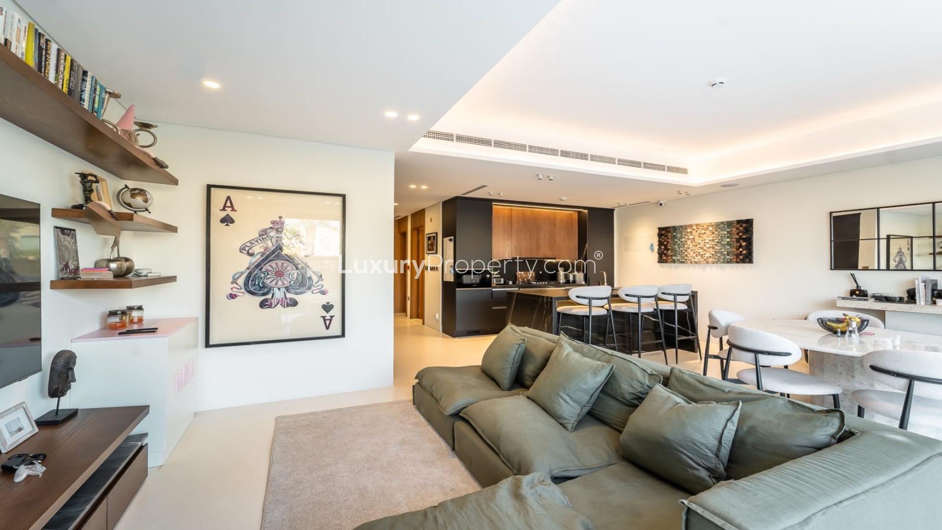 Modern living room in Jumeirah Golf Estates townhouse, spacious with garden view, LP48762