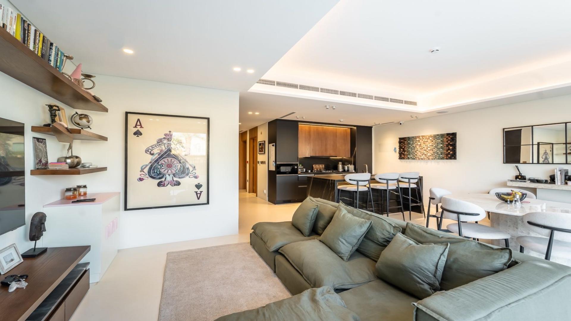 Modern living room in Jumeirah Golf Estates townhouse, spacious with garden view, LP48762