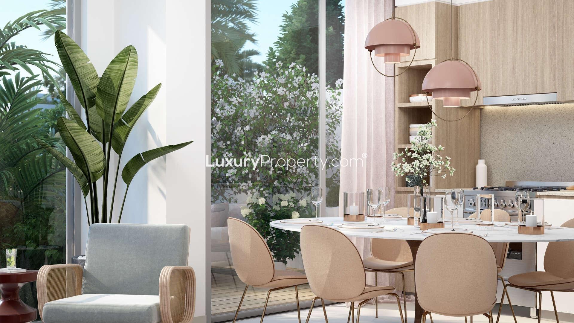 Modern living room with garden view in Arabian Ranches III townhouse for sale