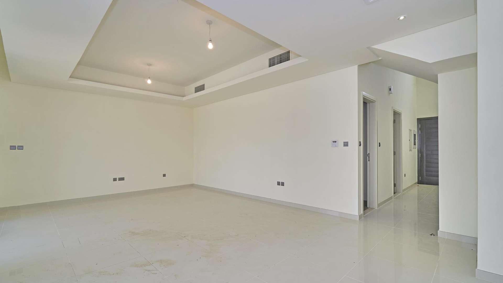Empty living room in 3-bedroom townhouse for sale, Damac Hills 2, Sycamore, Akoya
