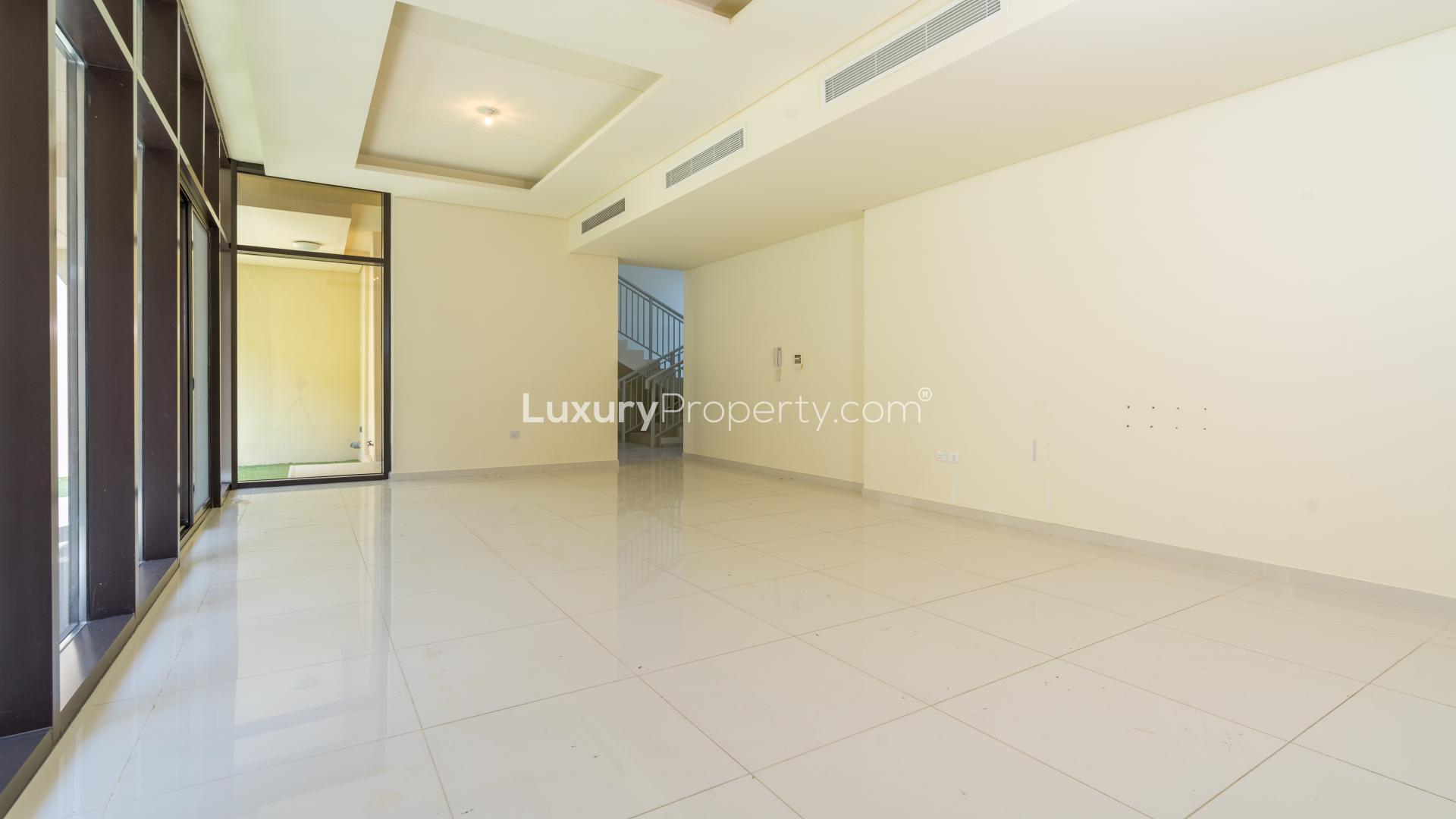 Modern staircase and entry door in Damac Hills Topanga townhouse, LP16327 for sale