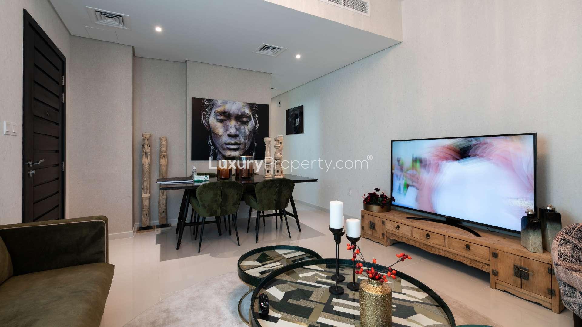 N/A,Elegant living room in Trixis townhouse, featuring modern decor and stylish furniture