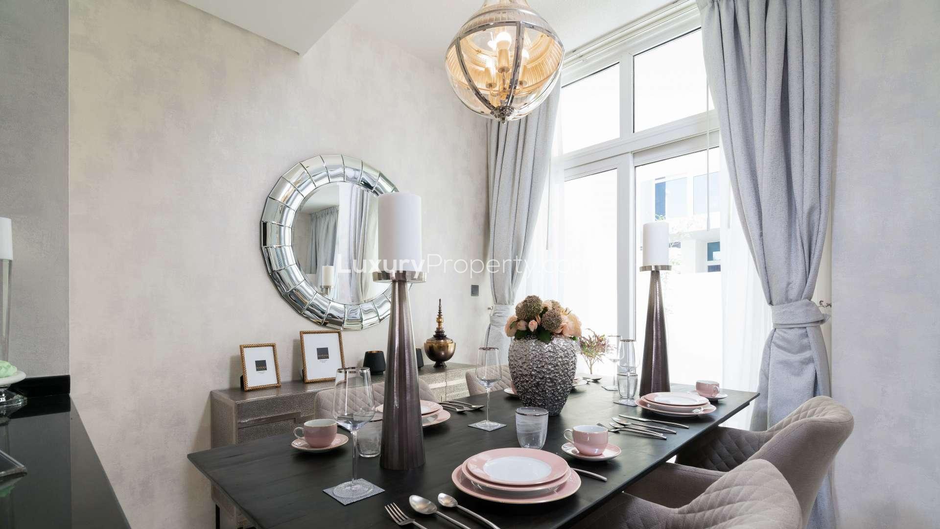 Modern kitchen and dining area in 3-bedroom townhouse, Damac Hills 2, Akoya, Vardon