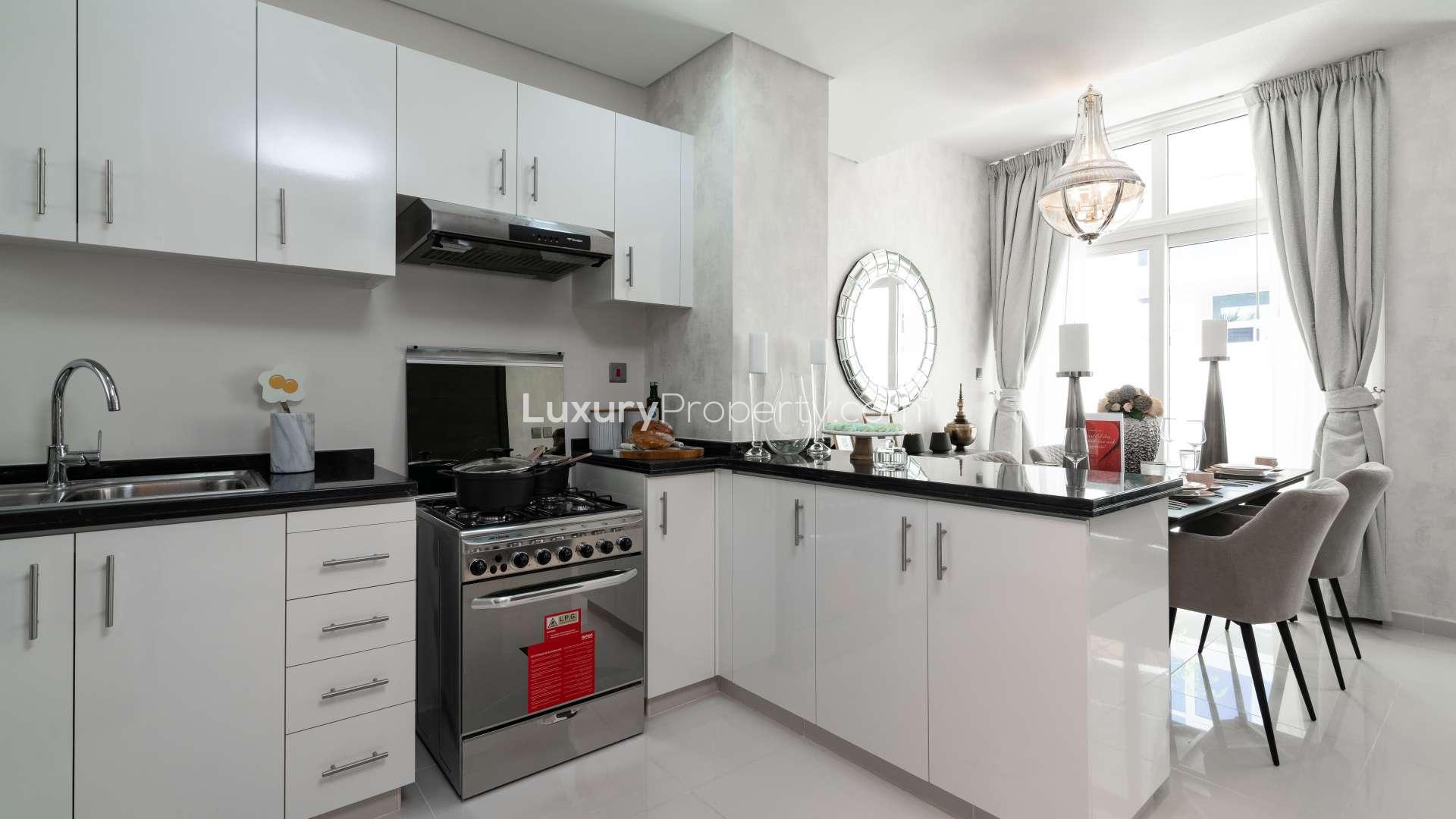 Modern living room and dining area in Damac Hills 2 townhouse, Vardon community