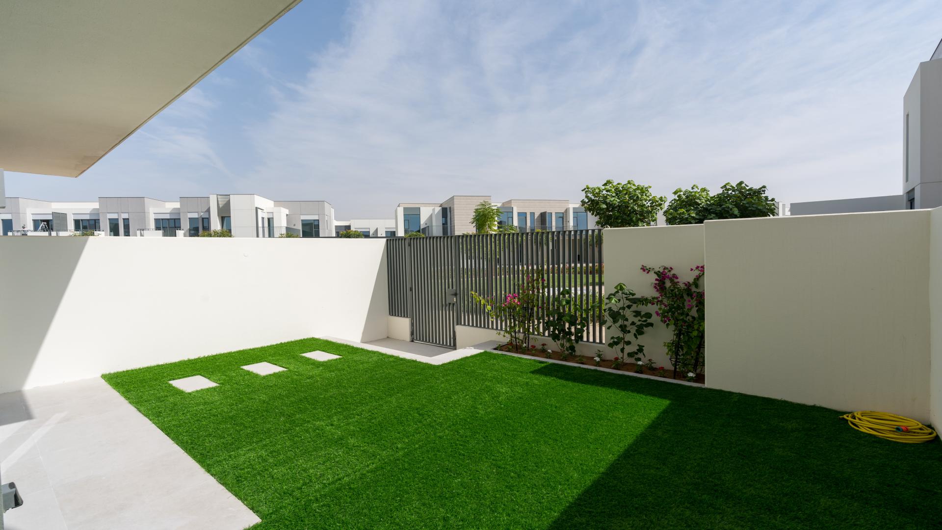 Modern single-row villa exterior in Arabian Ranches 3, Sun community, for sale