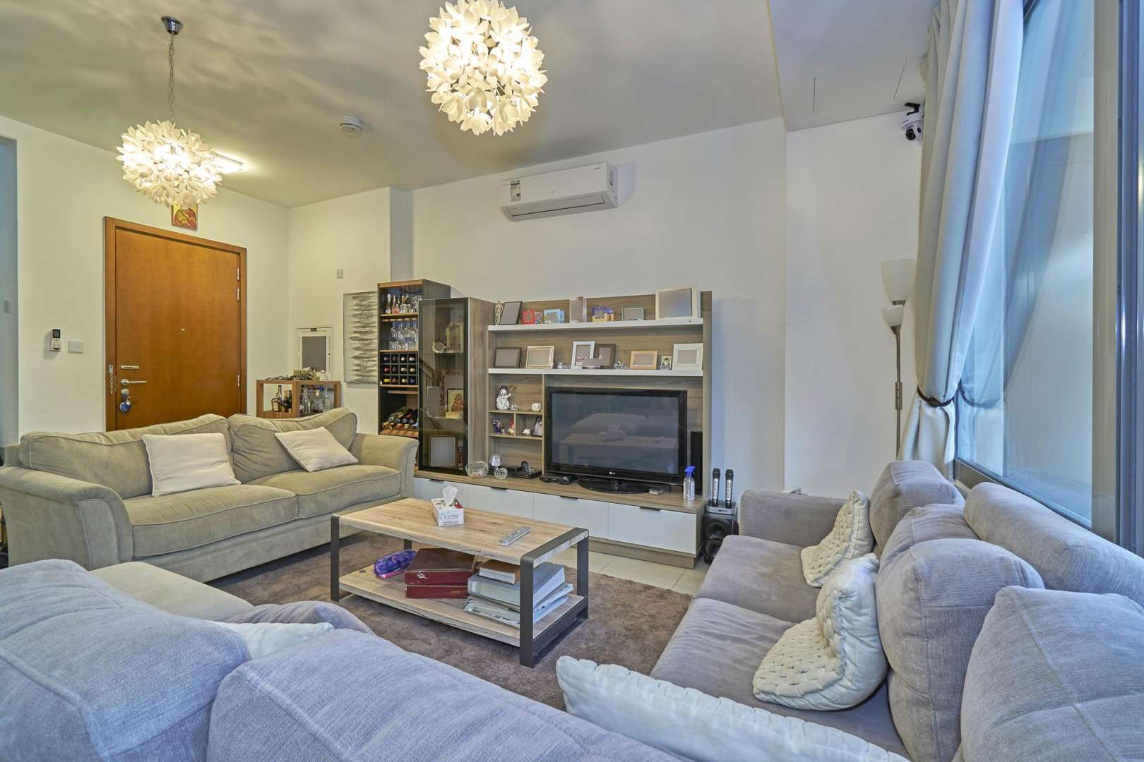 Contemporary living room in Zahra Townhouse, Town Square with modern decor and cozy seating