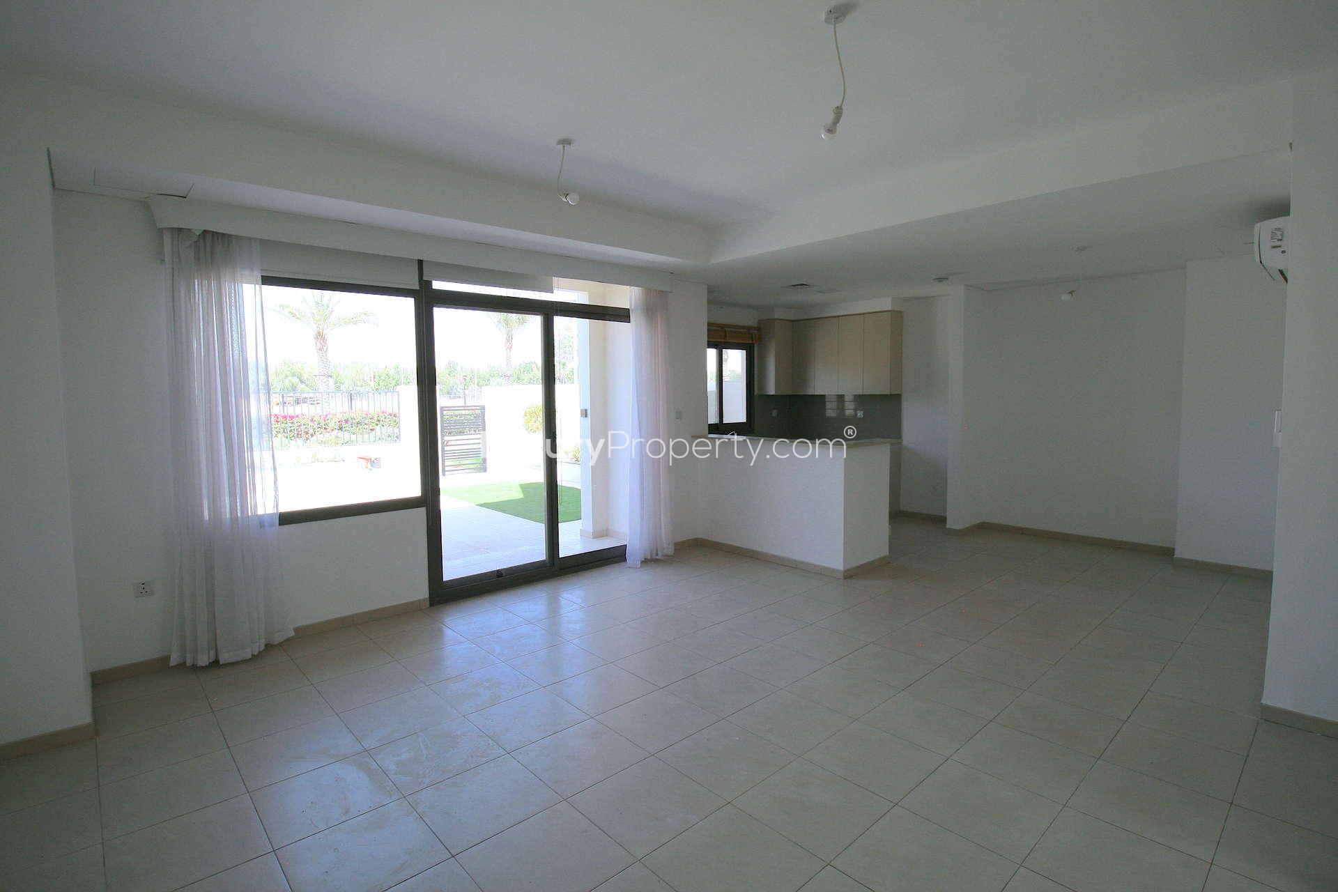 Modern kitchen in 3-bedroom Zahra Townhouse for rent, Town Square, Dubai