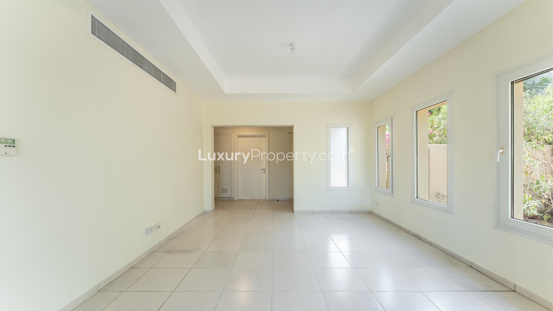 Bright living room in 3-bedroom villa, The Springs, Emirates Living, with tile flooring