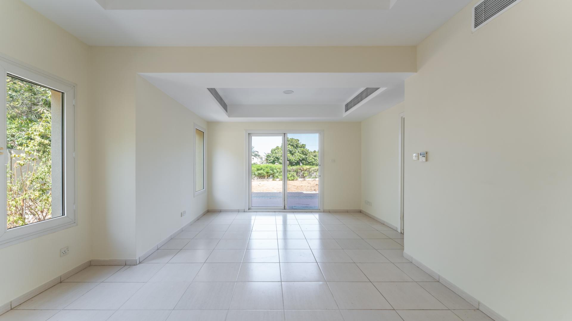 Scenic balcony view from 3-bedroom villa in The Springs, Emirates Living, overlooking lush greenery