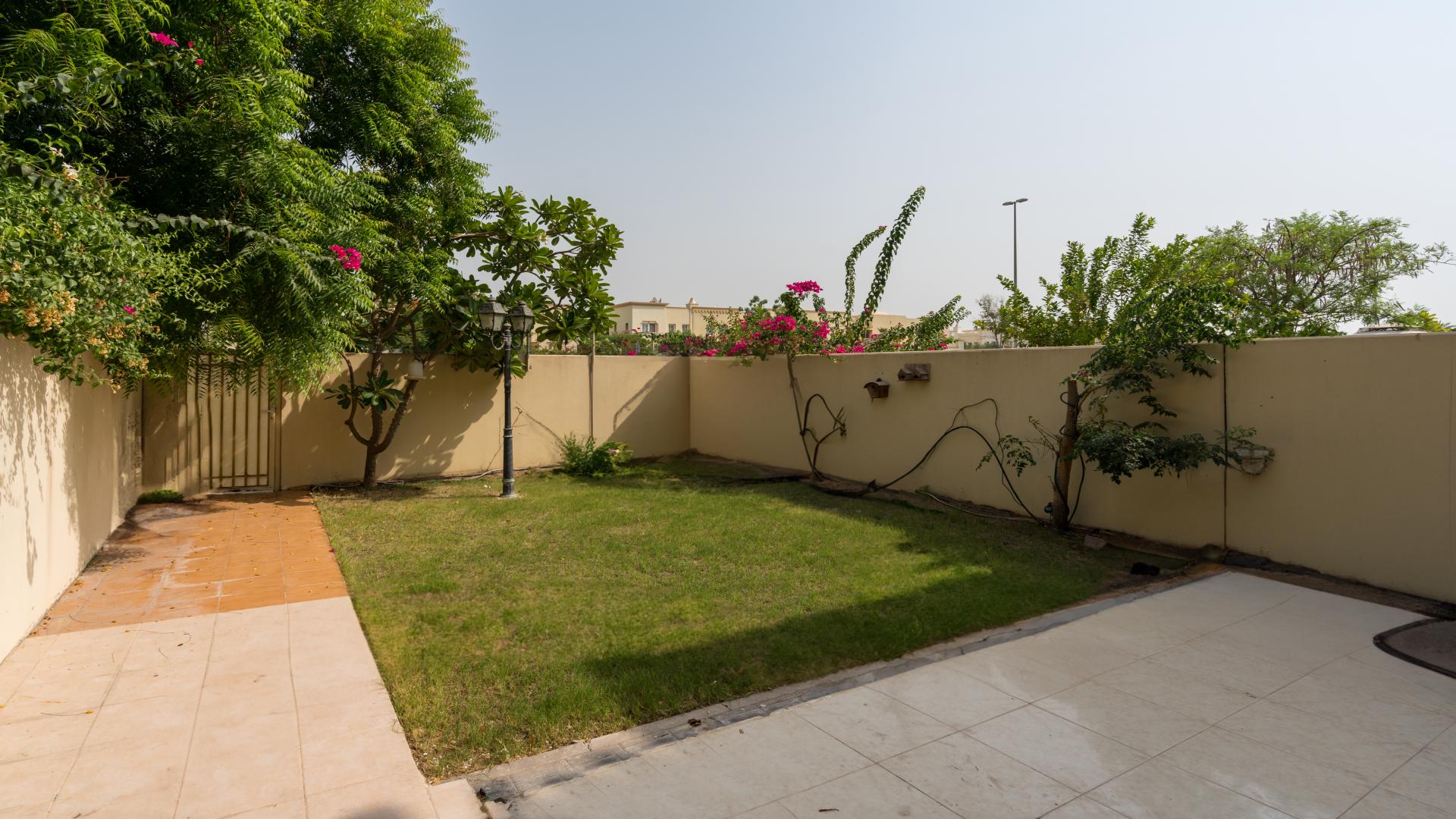 Bright living room with garden view in Springs 4 villa, Emirates Living