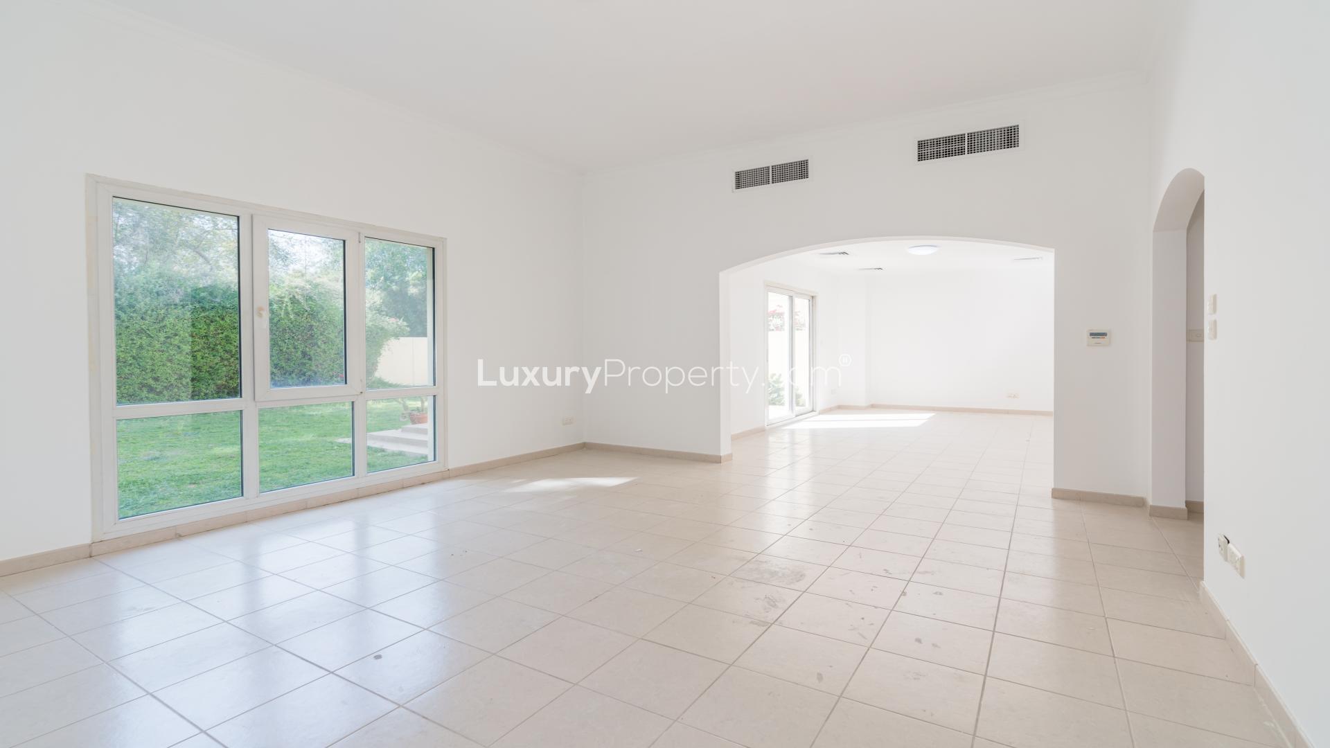 Spacious villa exterior with lush garden in Meadows 9, Emirates Living for rent