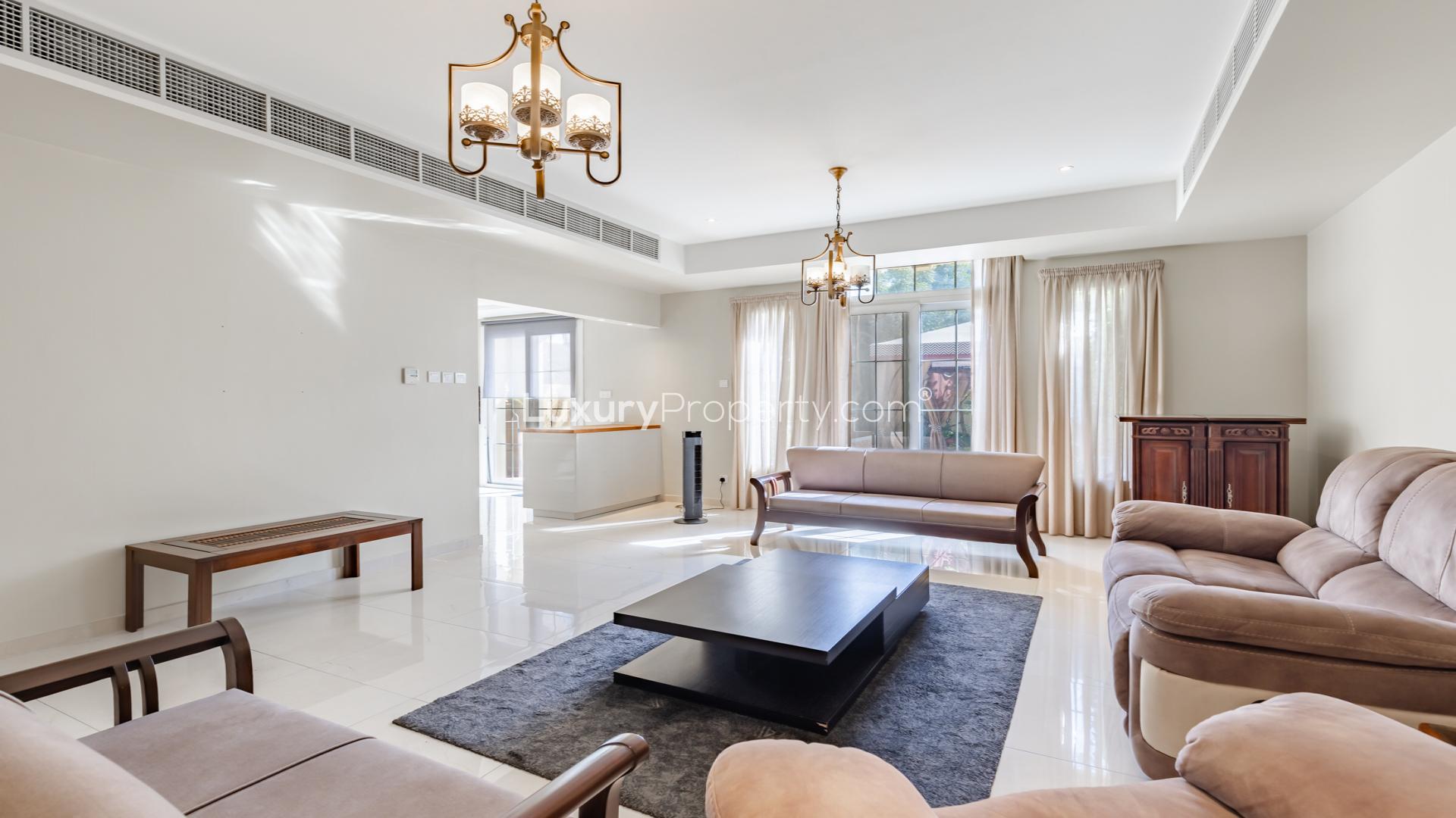 Upgraded 3-bedroom villa exterior with garden in The Springs, available for rent