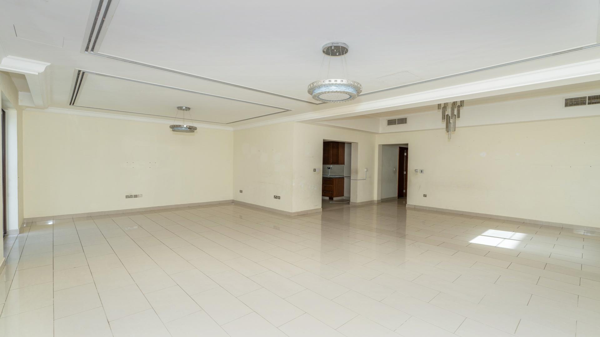 Spacious living area in prime Casa villa rental, Arabian Ranches 2, with modern kitchen access