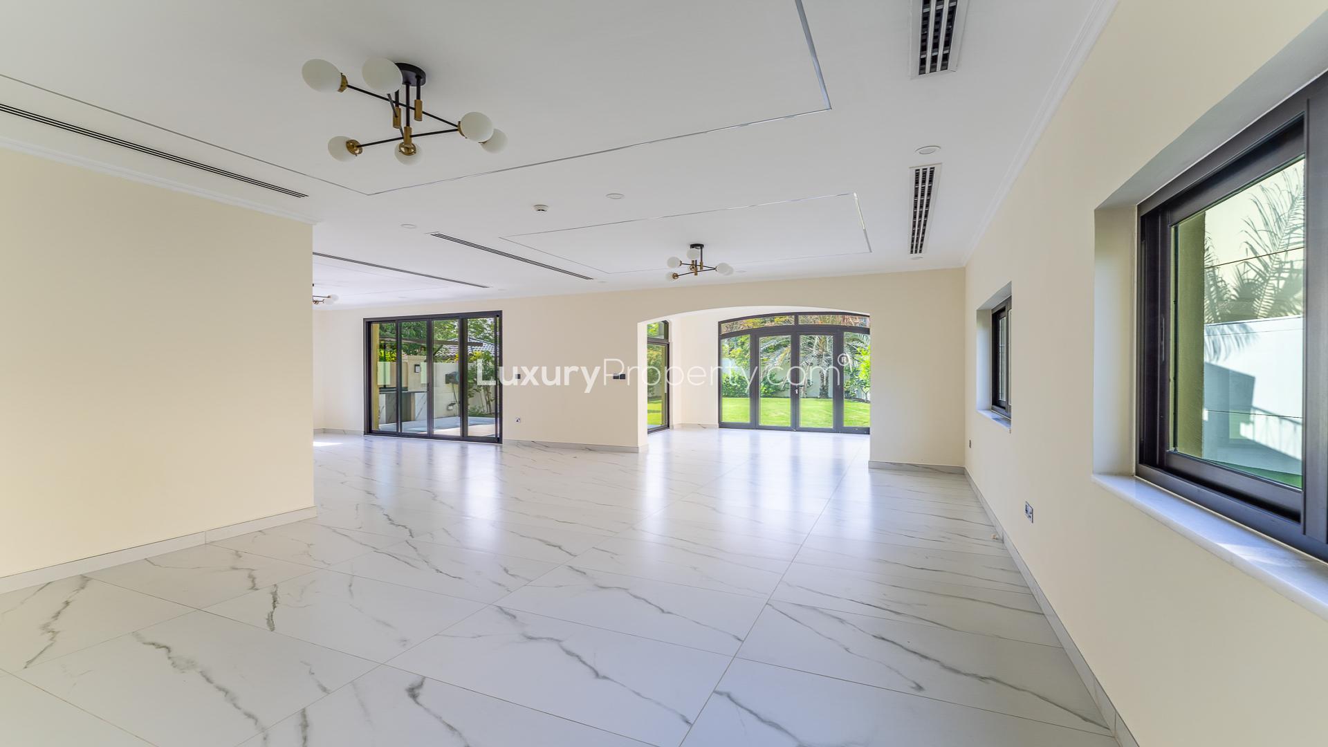 Exterior view of spacious 3-bedroom Legacy Villa with garden in Jumeirah Park for rent