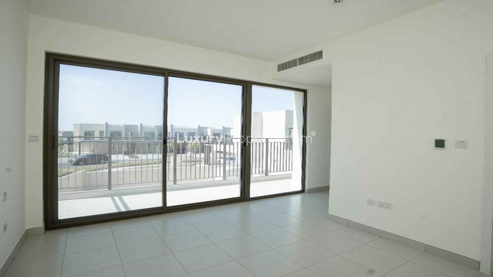 Bright, modern kitchen and living area in Emaar South Parkside villa for rent