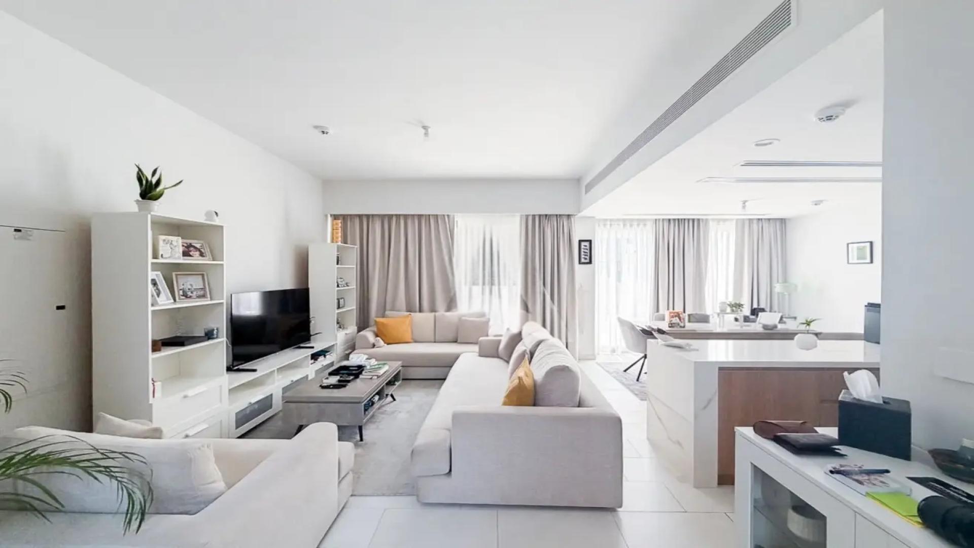 Fully furnished living room in La Rosa 6 villa, featuring modern decor and open layout