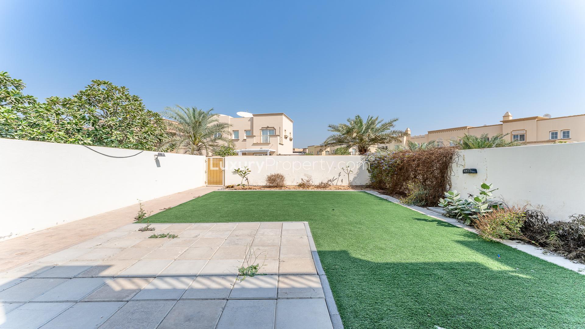 Spacious living room in family-friendly villa, Springs 3, Emirates Living, with garden view