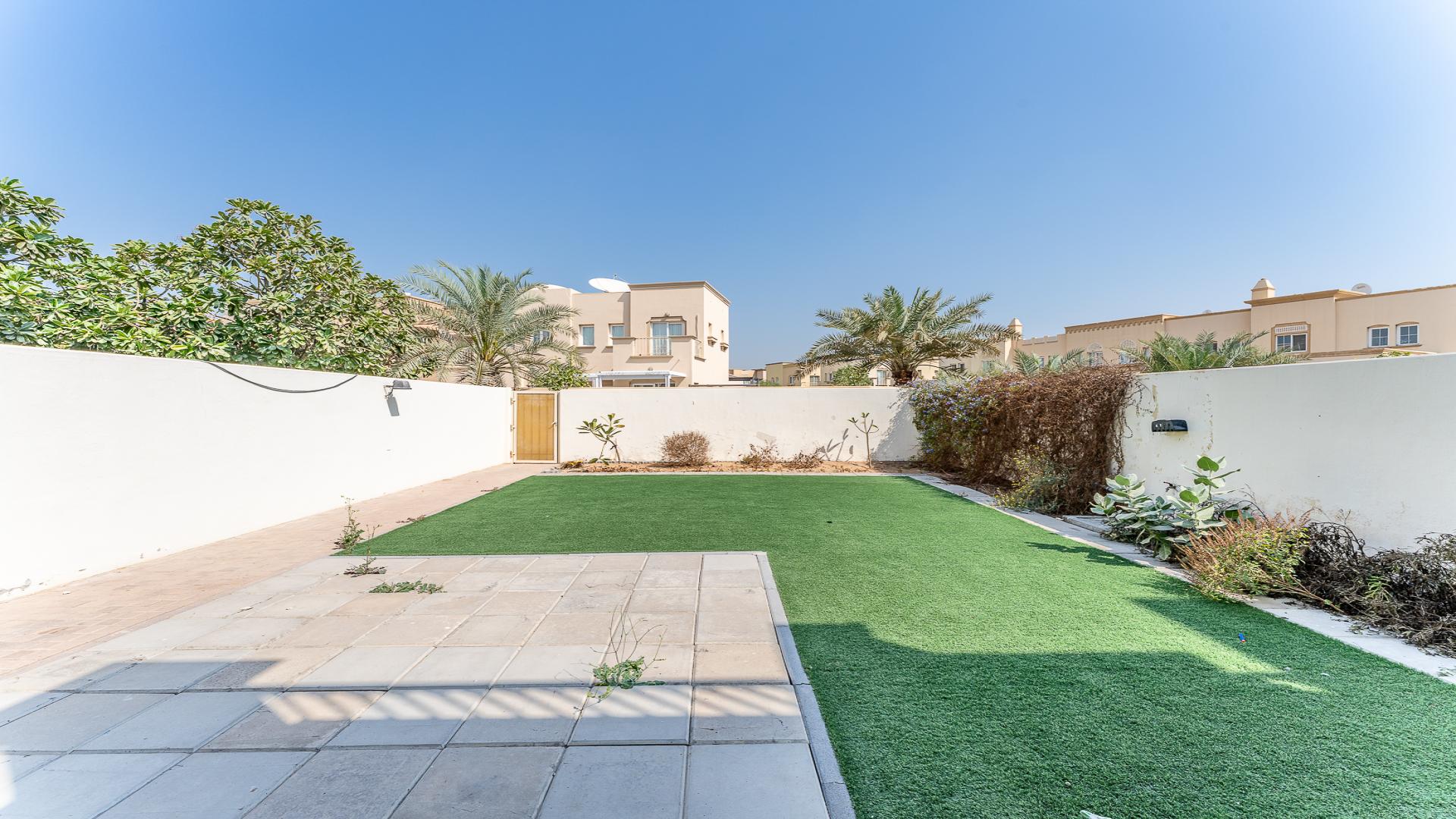 Spacious living room in family-friendly villa, Springs 3, Emirates Living, with garden view