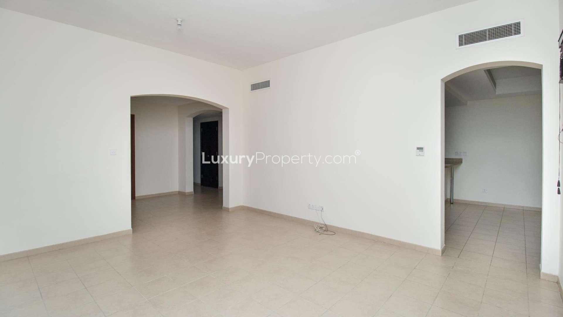 Bright living room with large windows in Al Reem 2, Arabian Ranches villa