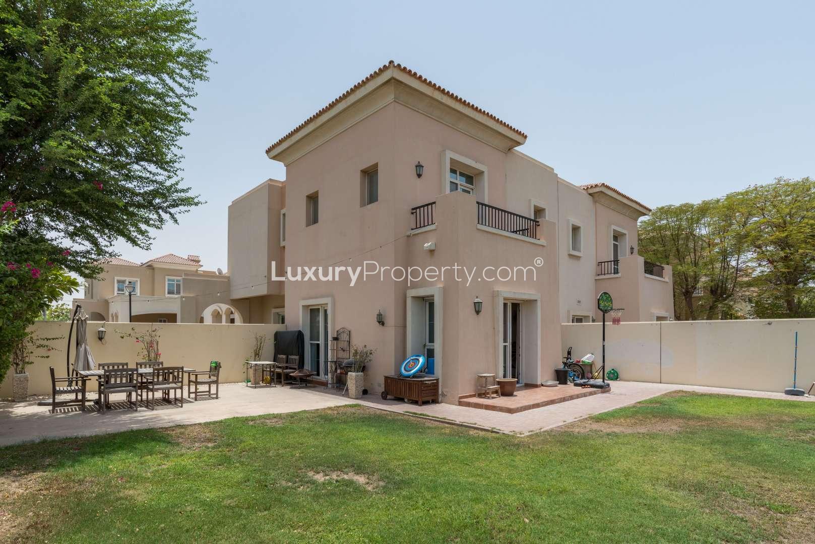 "Al Reem 1 villa interior with staircase and kitchen view in Arabian Ranches.",Corner Type 3E Villa with landscaped garden in Al Reem 1, Arabian Ranches