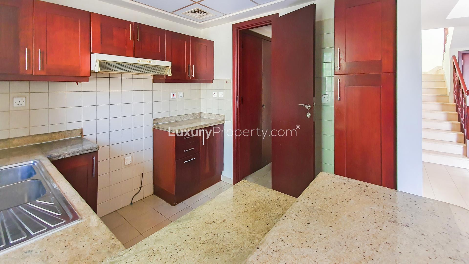 Modern kitchen in 3-bedroom townhouse for rent, Al Reem, Arabian Ranches