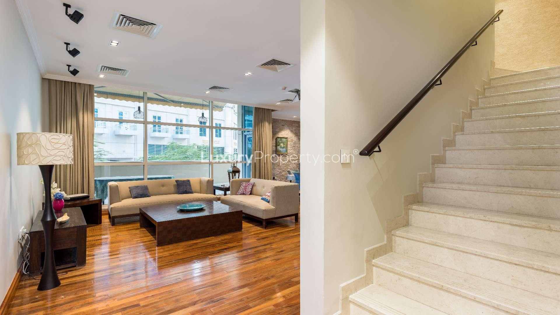 Living room and staircase in furnished 3-bedroom duplex villa, Al Sahab 1, Dubai Marina
