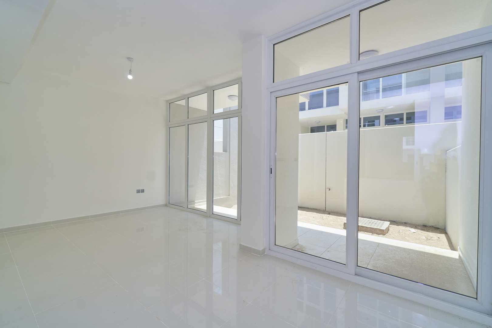 Three-bedroom townhouse in Albizia, Damac Hills 2, with open views and modern design