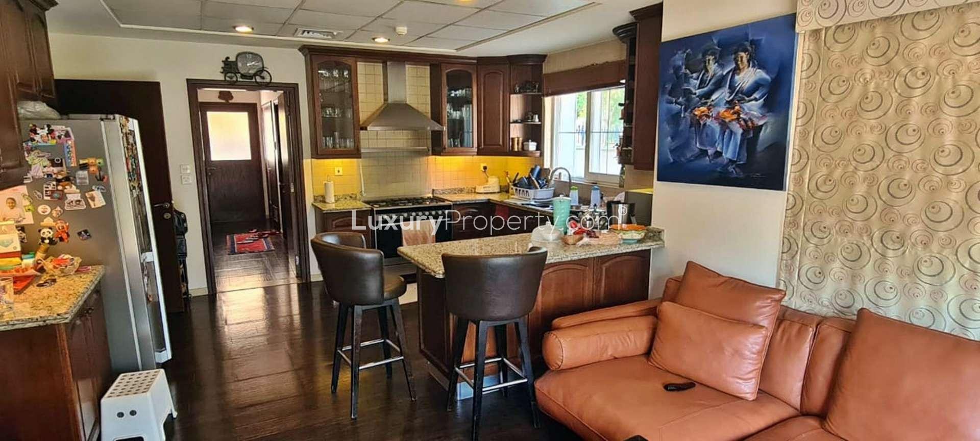 Elegant living room in Alvorada villa, Arabian Ranches with stylish decor and art