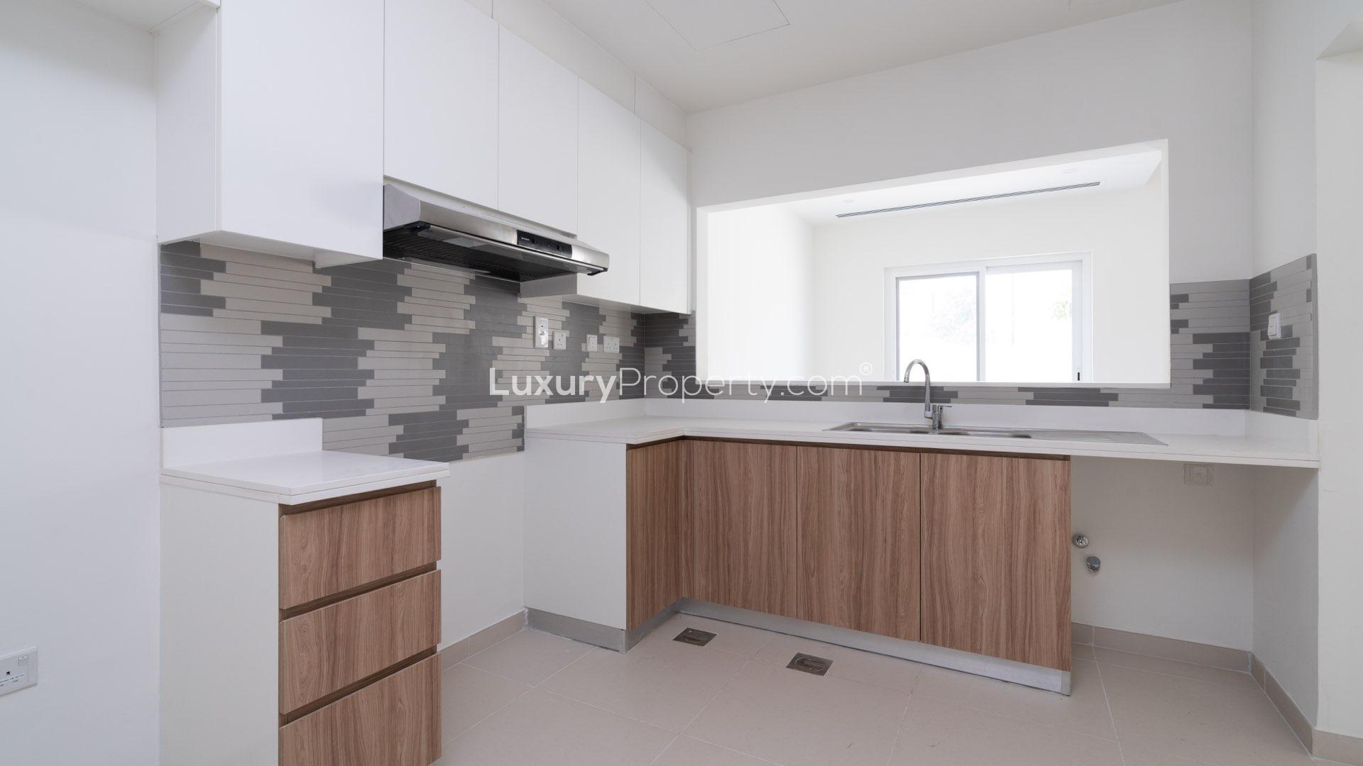Bright living area in modern 3-bed townhouse, Amaranta Villanova, featuring open layout and staircase
