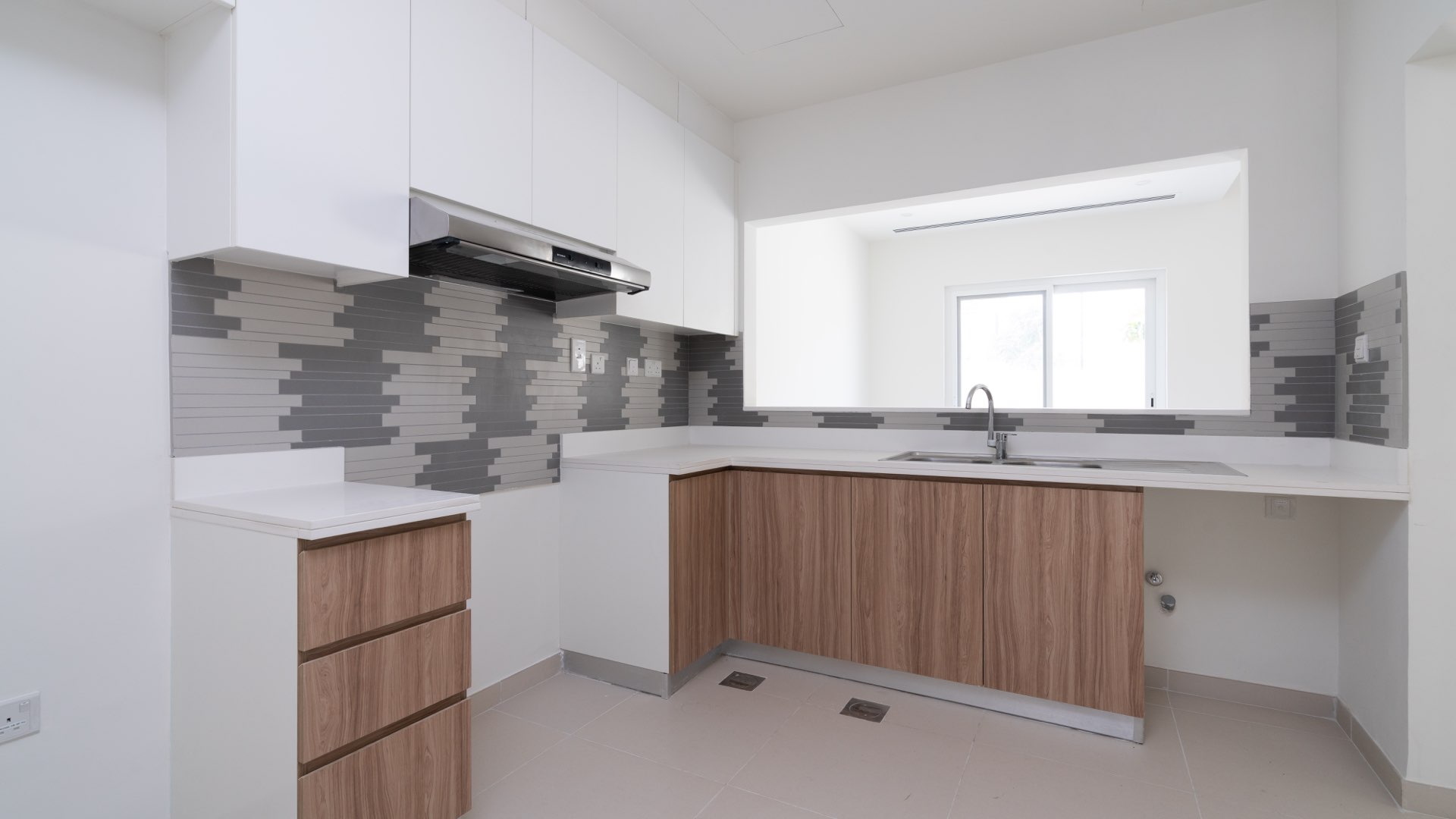 Bright living area in modern 3-bed townhouse, Amaranta Villanova, featuring open layout and staircase