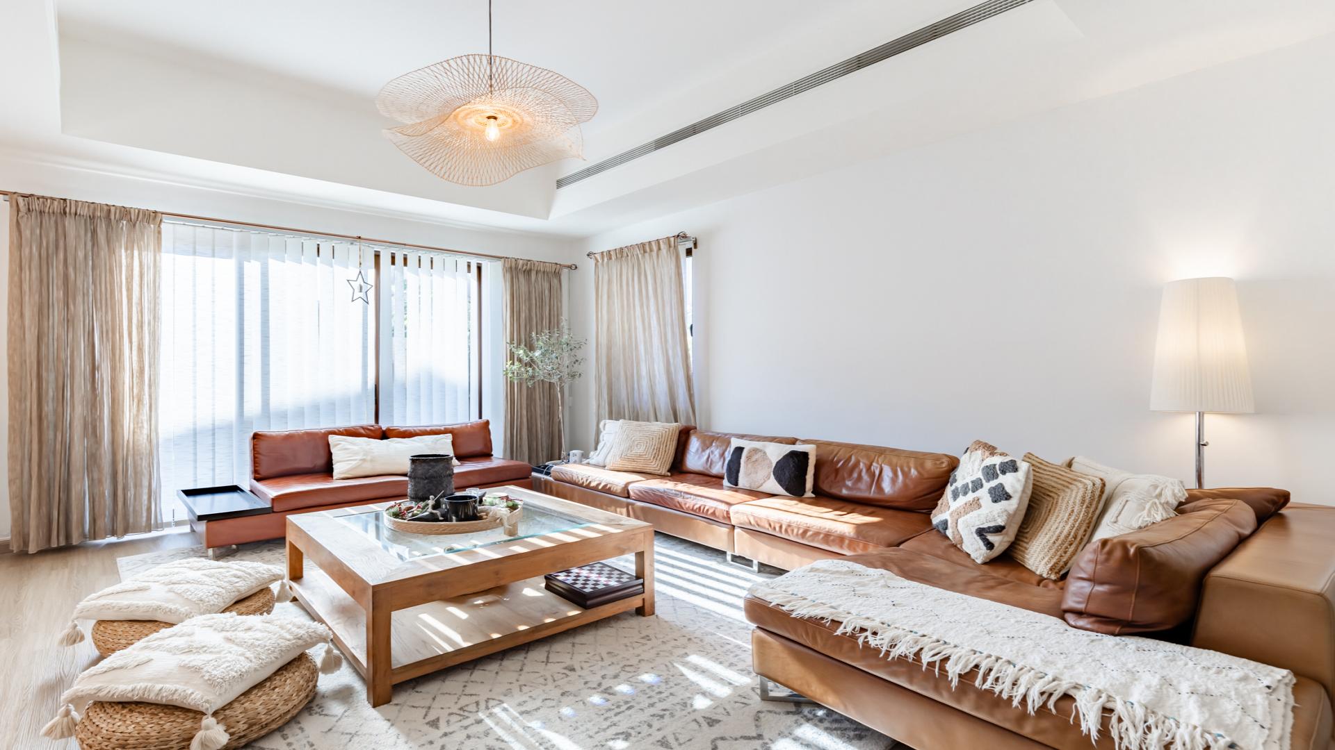 Outdoor patio with seating and dining area in modern 3-bed villa, Mira, Reem community