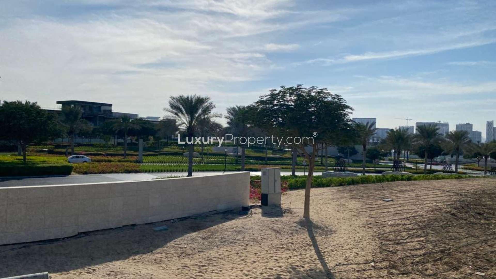 N/A,Dubai Hills Estate villa view with landscaped gardens and distant city skyline, LP10426