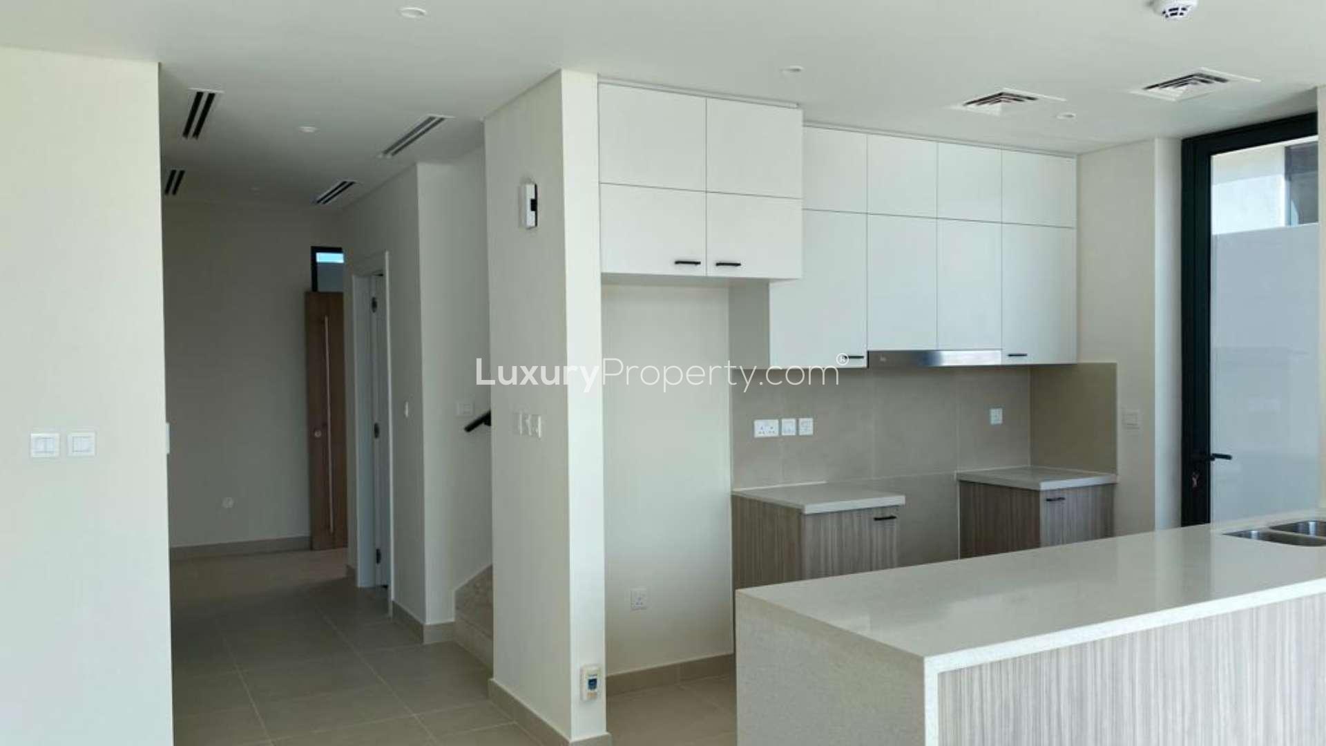 Modern villa exterior in Dubai Hills Estate, spacious outdoor area, Club Villas community