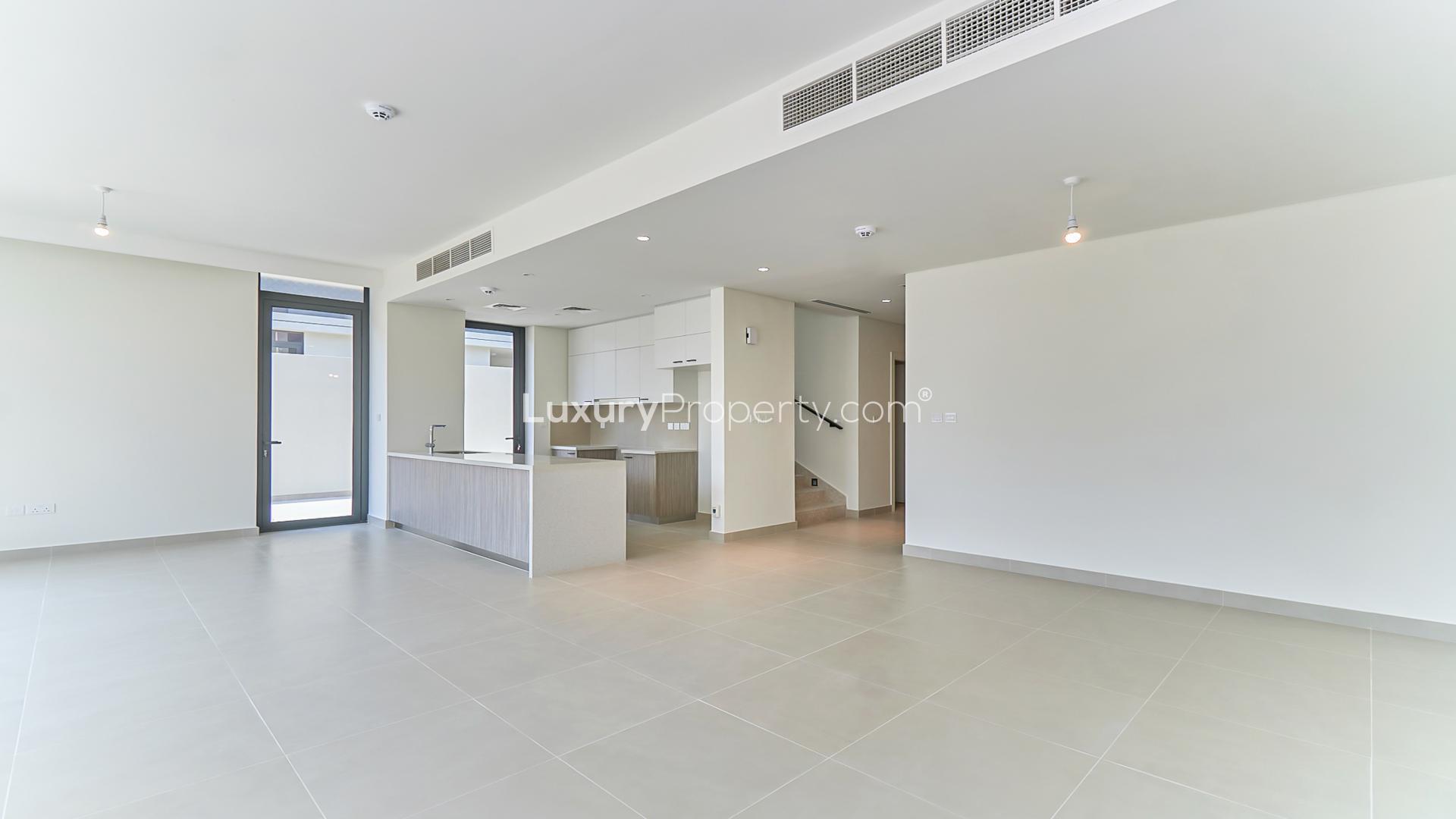 Lovely villa exterior with glass facade in Dubai Hills Estate, featuring park views