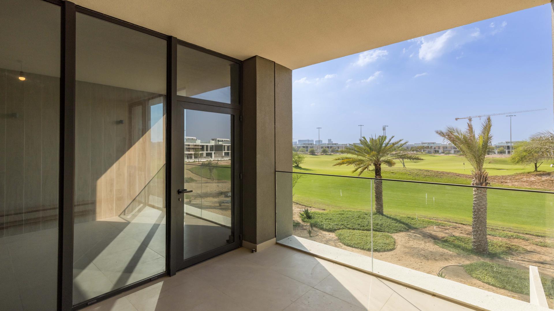 "Spacious open-plan living area in Club Villas at Dubai Hills Estate villa for rent.",Lovely villa balcony view overlooking park at Club Villas, Dubai Hills Estate