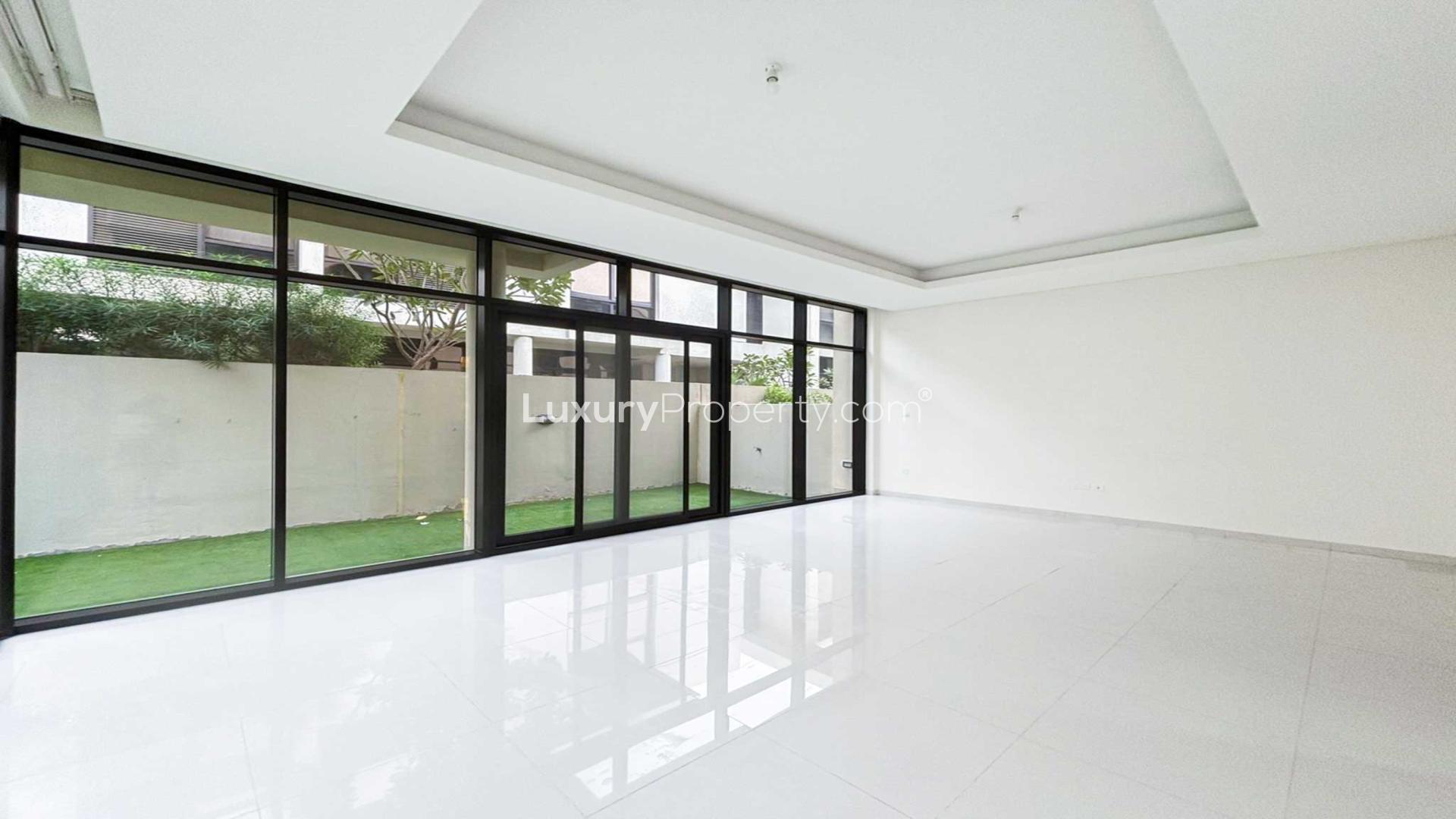 Spacious living room in Topanga villa with large windows and garden view