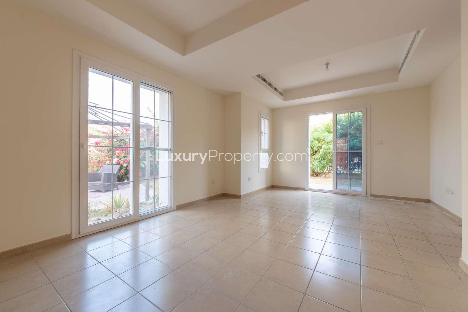 Spacious living area in 3-bedroom villa, Ghadeer, The Lakes, Dubai, with large windows