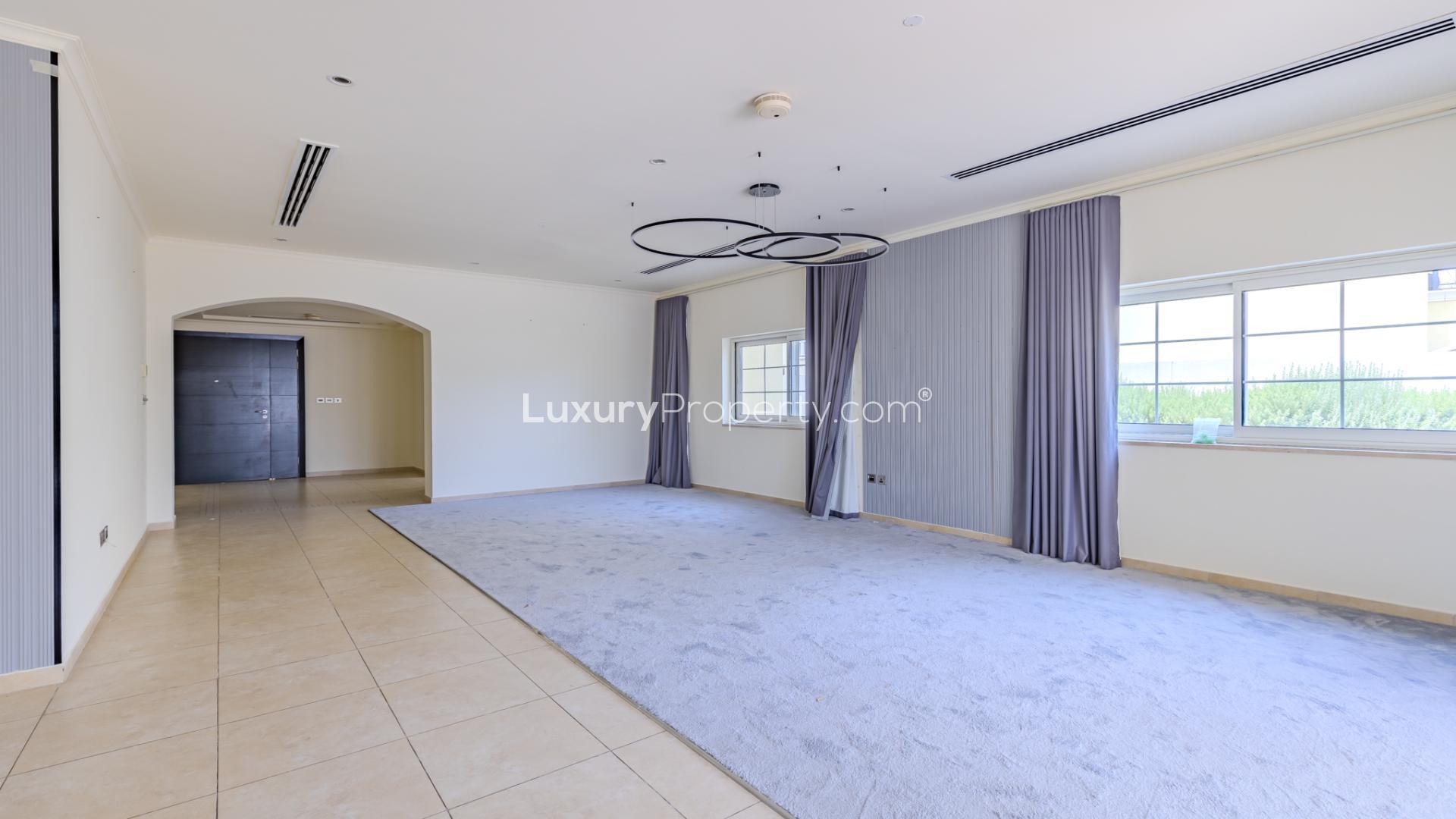 Spacious living area in Legacy Villa, Jumeirah Park, with modern design and elegant lighting