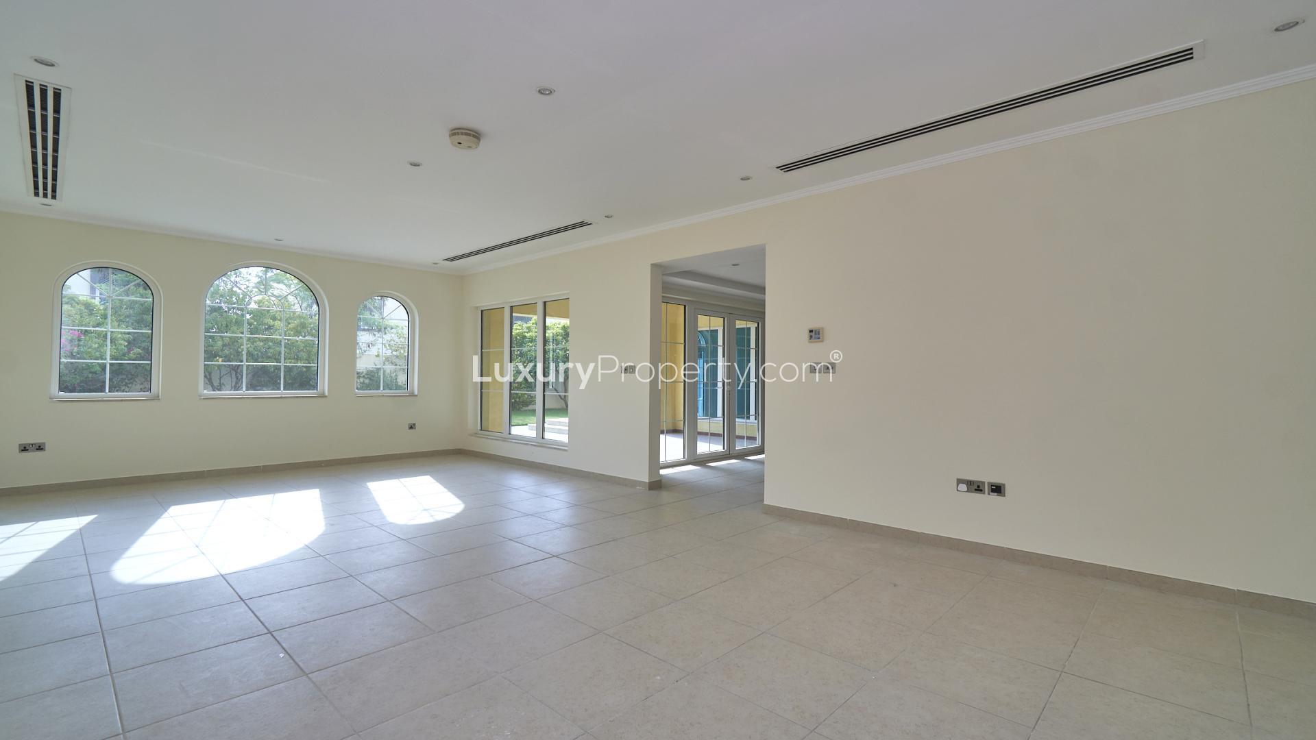 Private pool in spacious Jumeirah Park Legacy villa for rent, surrounded by lush greenery
