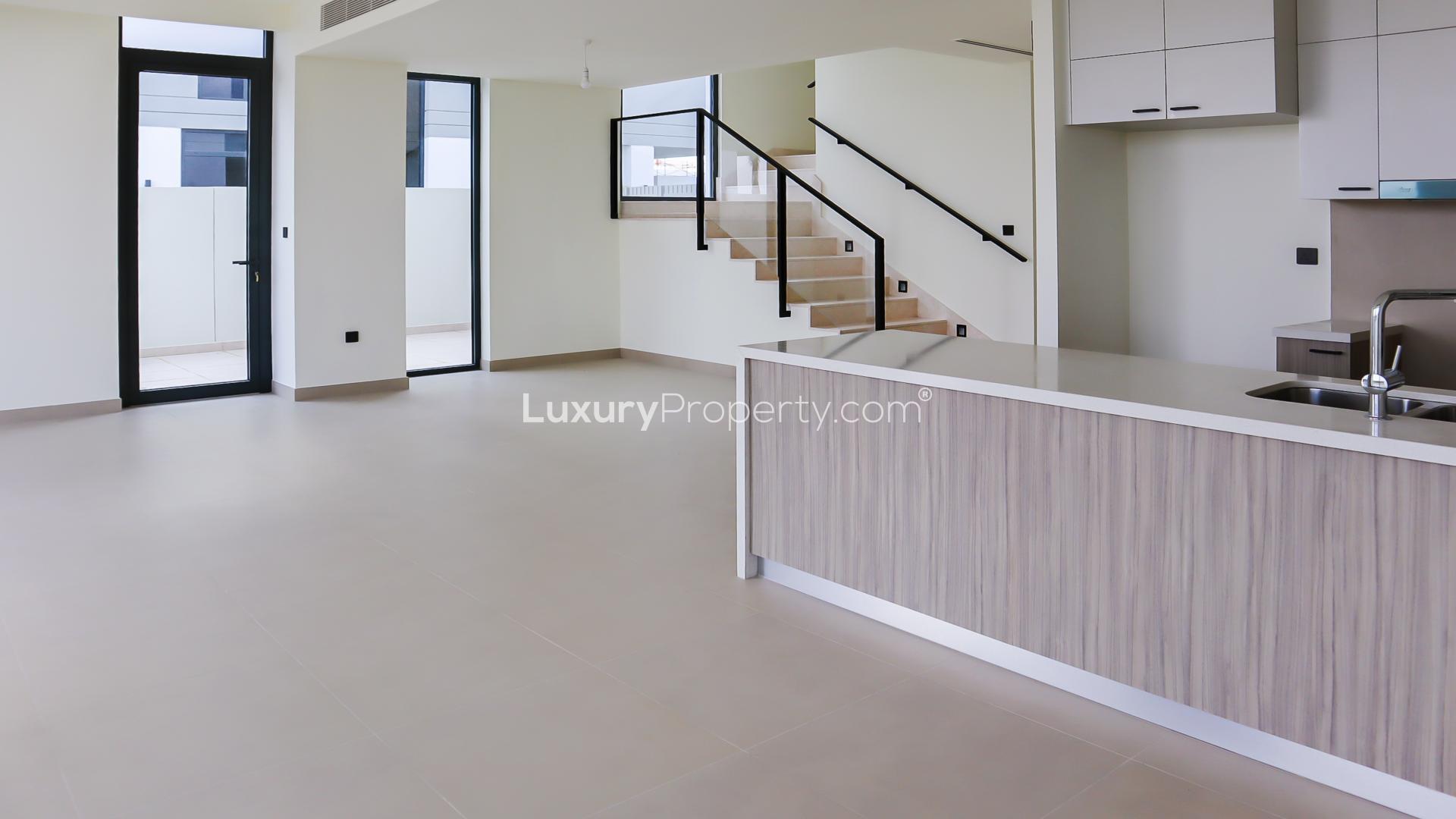 Beautiful three-bedroom villa exterior in Golf Grove, Dubai Hills Estate, available for rent