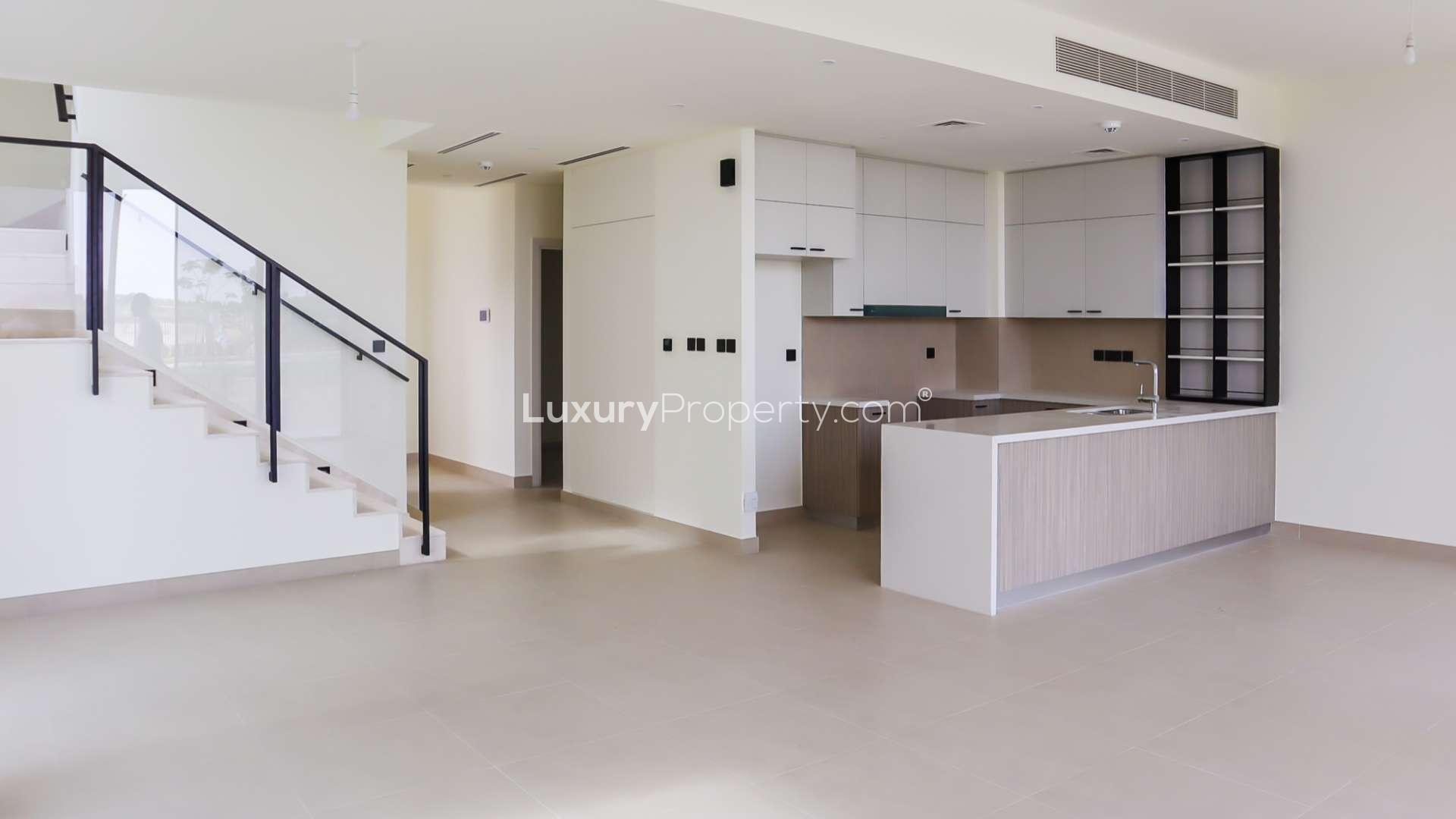 Brand new villa interior with modern kitchen and staircase in Dubai Hills Estate, Golf Grove